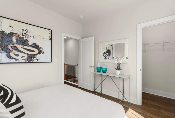 Bedroom with walk-in closet